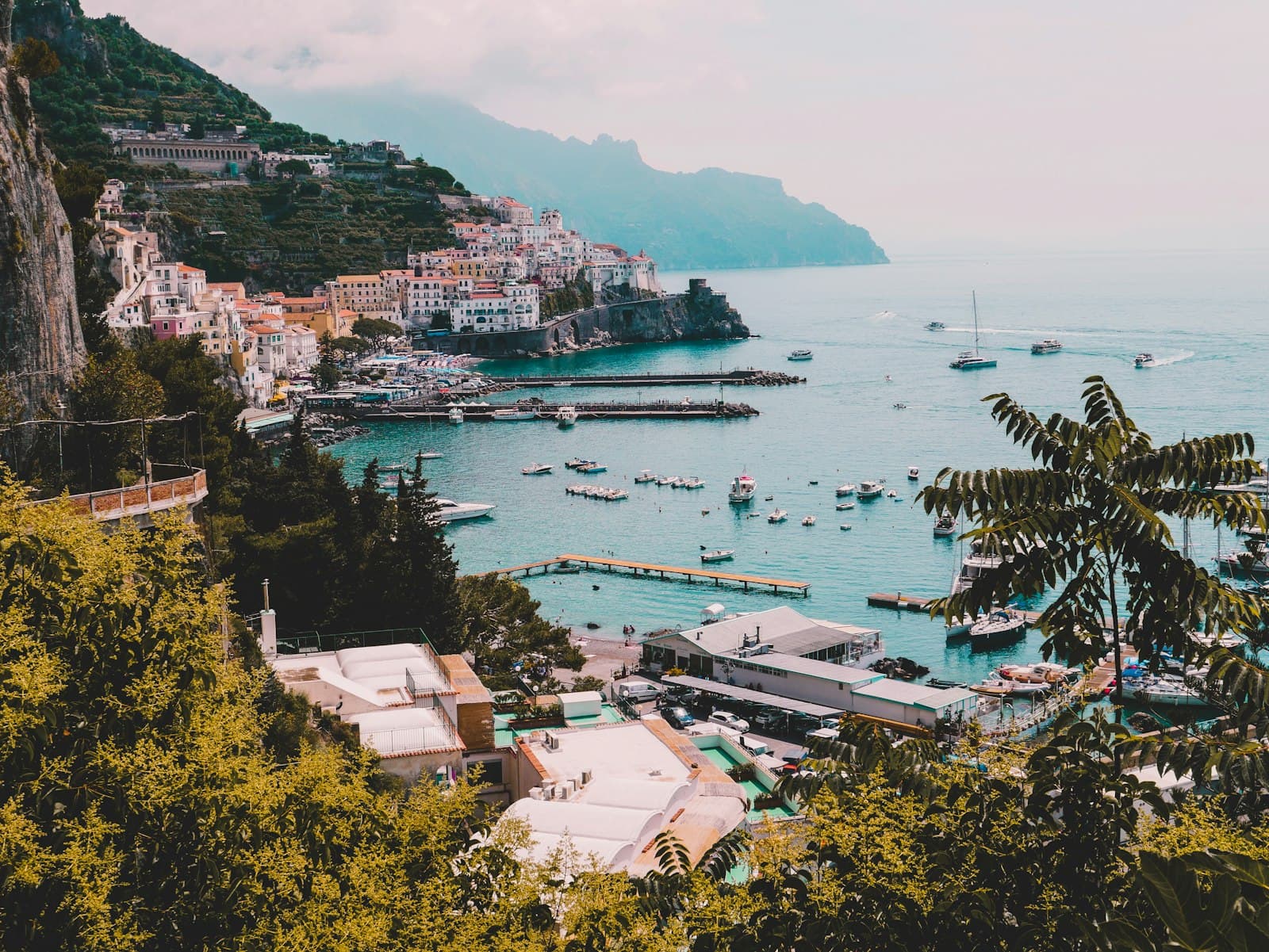 An Italian port town above the sea the shipments cross