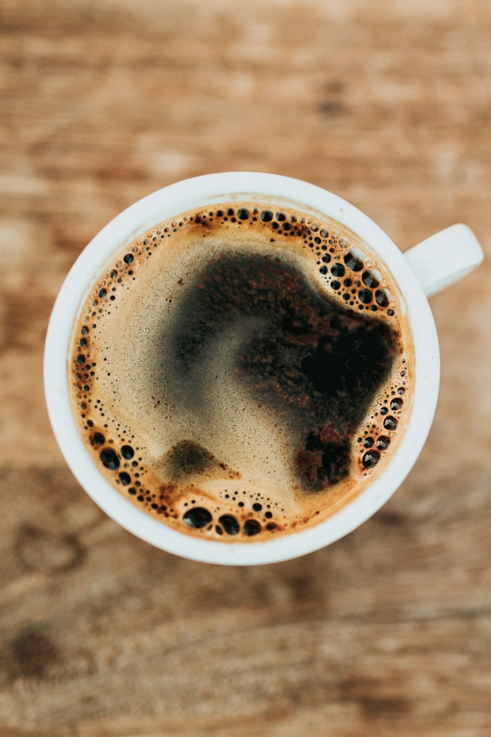 An espresso served on a marble counter